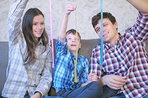 Family playing with slime