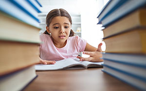 stressed out little looking at homework