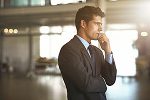 Cropped shot of a businessman looking stressed in the office